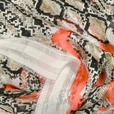 Mousseline imprimée bande satin serpent et tache corail