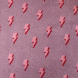 Fausse fourrure sherpa éclairs fond lilas