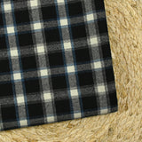 Flanelle de laine à carreaux blanc cassé et bleu fond noir
