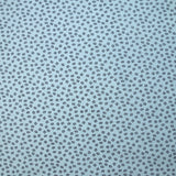 Jersey de coton imprimé feuilles fond bleu ciel