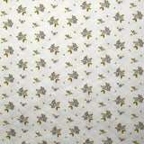Jersey de coton matelassé imprimé fleurettes gris fond blanc