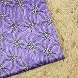 Jersey de viscose satiné imprimé étoile blanche fond mauve