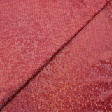 Jersey imprimé pois argentés holographiques fond corail