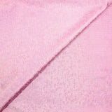 Jersey printed with holographic silver polka dots, candy pink background