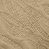 Jersey matelassé fissures fond beige