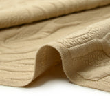 Jersey matelassé fissures fond beige