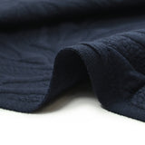 Matelassé jersey fissures navy blue background