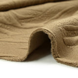 Jersey matelassé fissures fond camel