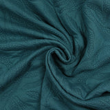 Jersey matelassé fissures fond pétrole