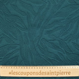 Jersey matelassé fissures fond pétrole