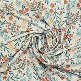 Tissu Maillot de bain recyclé UPF50 fleurs du printemps fond blanc cassé