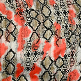 Mousseline imprimée bande satin serpent et tache corail