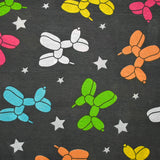 Polycoton imprimé ballon chien fond gris