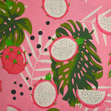 Polycoton imprimé monstera et fruit du dragon fond rose