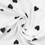 Cotton poplin printed black heart white background