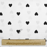 Cotton poplin printed black heart white background