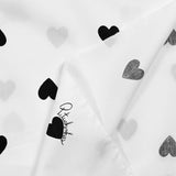 Cotton poplin printed black heart white background