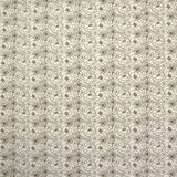 Popeline de coton imprimée esquisse florale marron fond écru