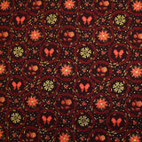 Popeline de coton imprimée poinsettias et nœuds orange fond marron