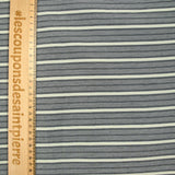 Clexión de ECRU polyviscosa tejida y scratch negro