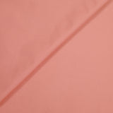 Satin de coton élasthanne fantaisie rose saumon