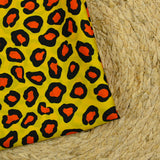 Satin polyester imprimé léopard fond jaune