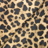 Scuba touché suédine imprimé léopard fond camel
