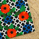 Sergé de coton et viscose coquelicot et mosaïque fond blanc