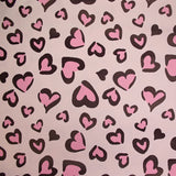 Tissu imperméable déperlant imprimé petit coeur rose