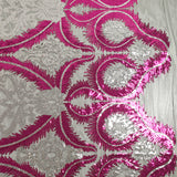Tulle sequin plumes royales argent et fuchsia