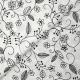 Twill de polyester brodé Solène fond blanc