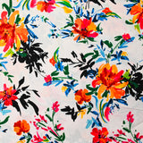 Viscose imprimée bataille de fleurs fond blanc