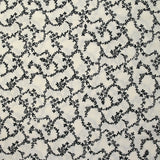 Viscose imprimée chaîne de fleurs fond blanc cassé