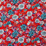 Viscose imprimée fleurs turquoise fond rouge