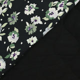 Viscose matelassée fleurs vertes fond bleu nuit envers noir