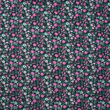 Voile de coton imprimé digital prairie de petites fleurs roses et vert d’eau sur fond noir