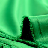 Crêpe satin polyester vert brillant