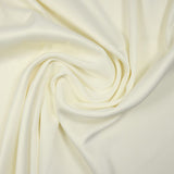 Crêpe satin polyester blanc cassé