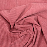 Old pink ribbed polyester velvet