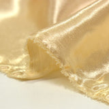 Crêpe satin polyester doré clair