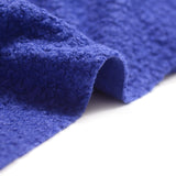 Lainage bouclette bleu violacé