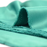 Crêpe satin polyester turquoise