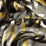 Mousseline de Soie noir Lys jacquard tissées or et argent