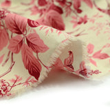 Popeline de coton imprimée fleurs et oiseaux rose fond écru