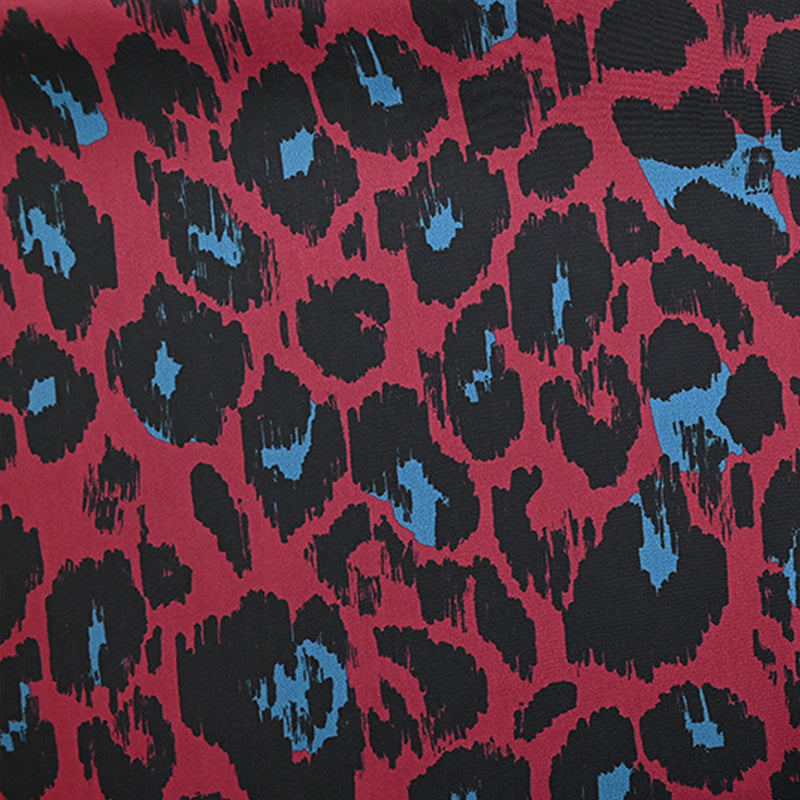 Satin de polyester léopard bleu fond bordeaux