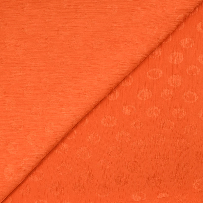 Mousseline polyester crinkle Elfy fond orange