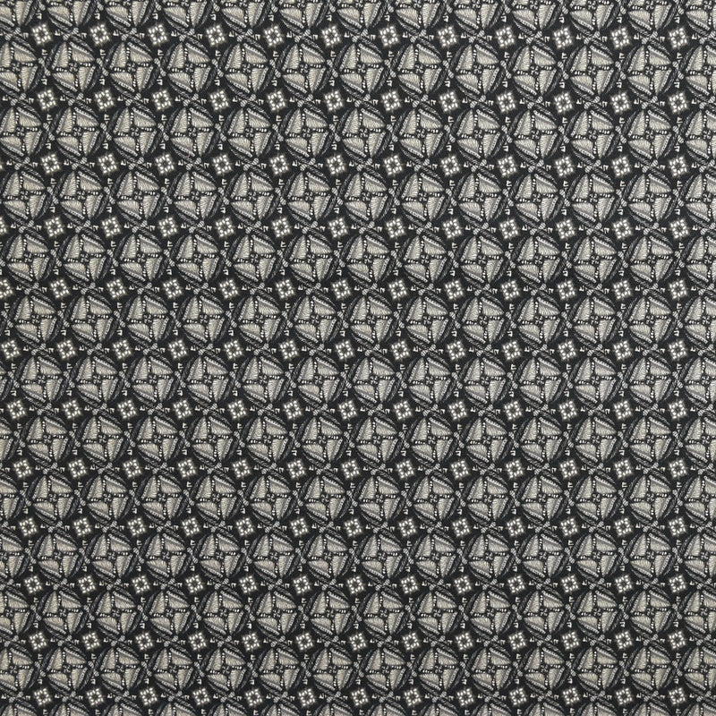 Gabardine de coton élasthanne imprimée Tourbillon gris fond noir