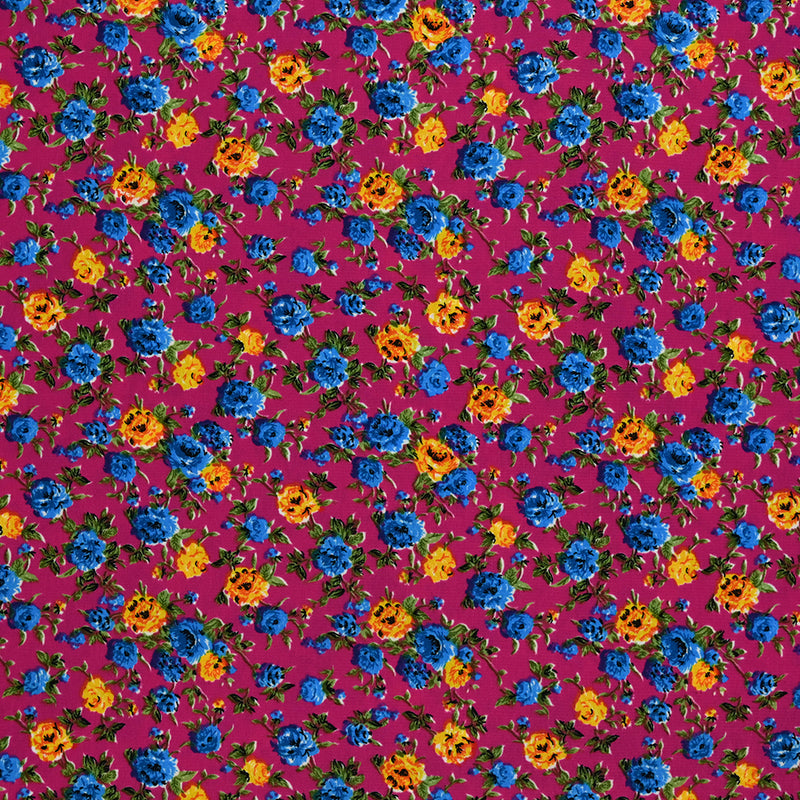 Crêpe de polyester imprimé fleurs bleu et jaune fond fuchsia