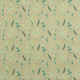 Coton imprimé branches fond vert pâle