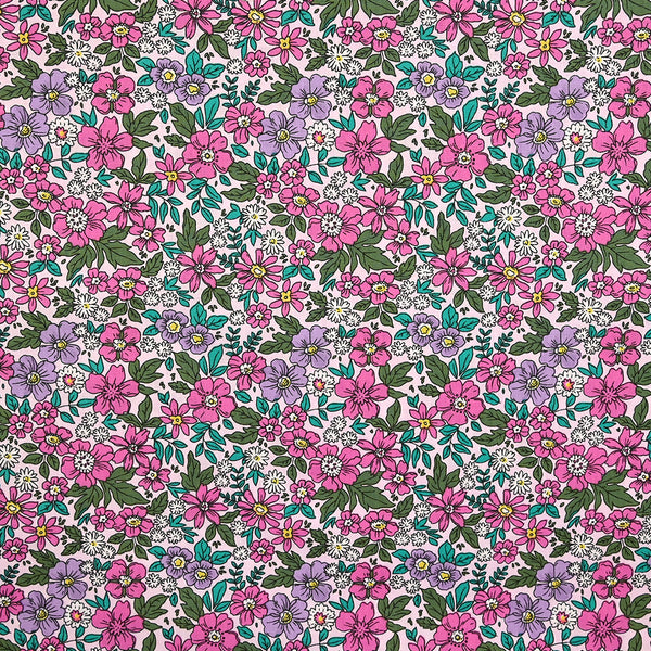 Popeline de coton imprimée printemps des fleurs rose et violet